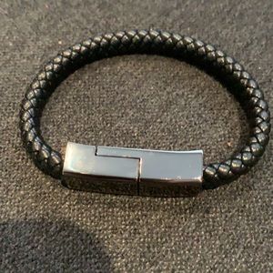iPhone charging bracelet brand new never used or worn. Fits iPhone X and compat.